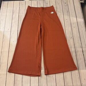 Nike‎ Cropped Wide-Leg Pants Women's Large Orange Sportswear Femme Ribbed Rust